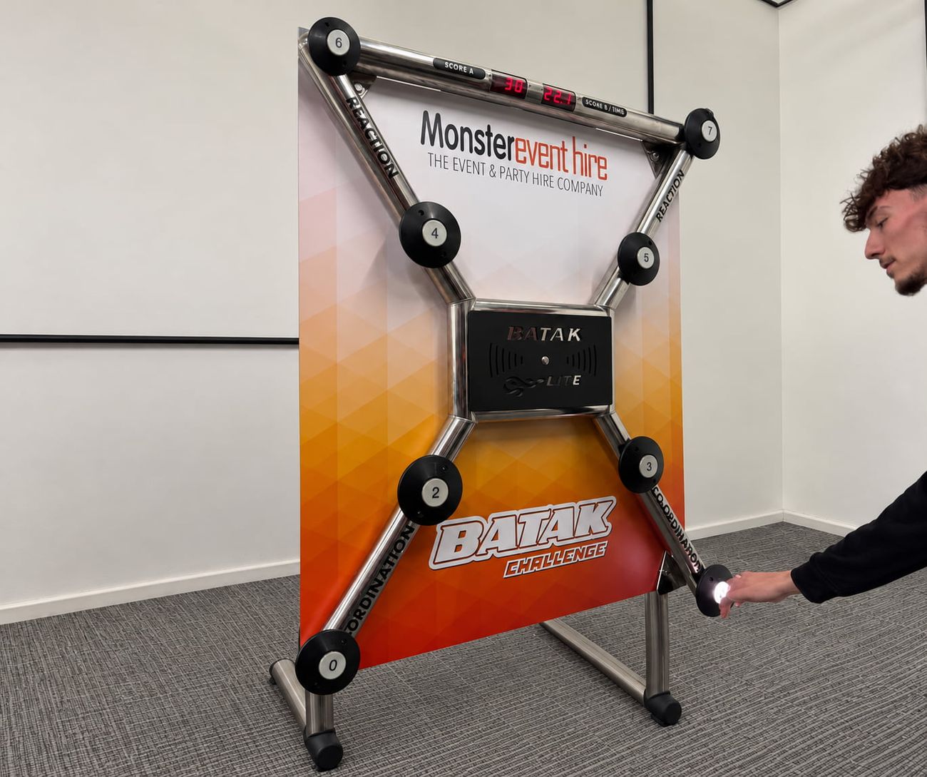 Close-up of the Monster-branded Batak Lite targets, control box and scoreboard