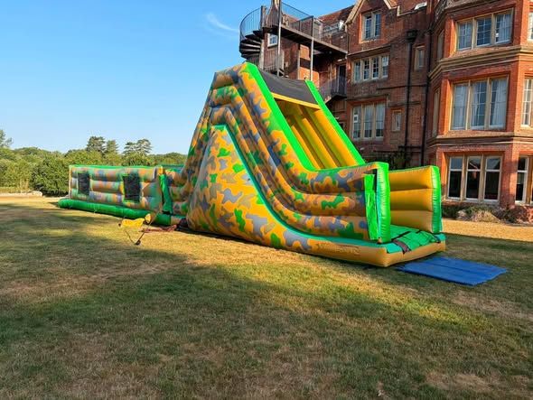 Camouflage inflatable obstacle course outside Embley School in Romsey
