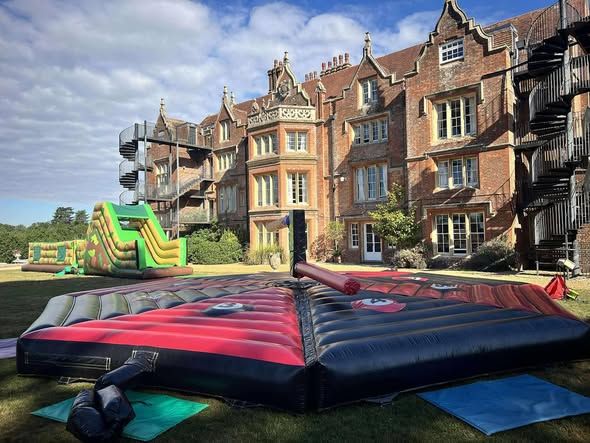 Outdoor inflatable activities for a prep school leavers event in Romsey