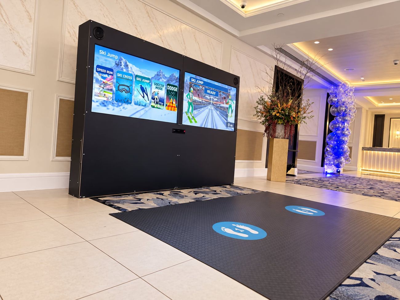 iWall ski simulator: the ski jump game on the twin screens in a hotel event space