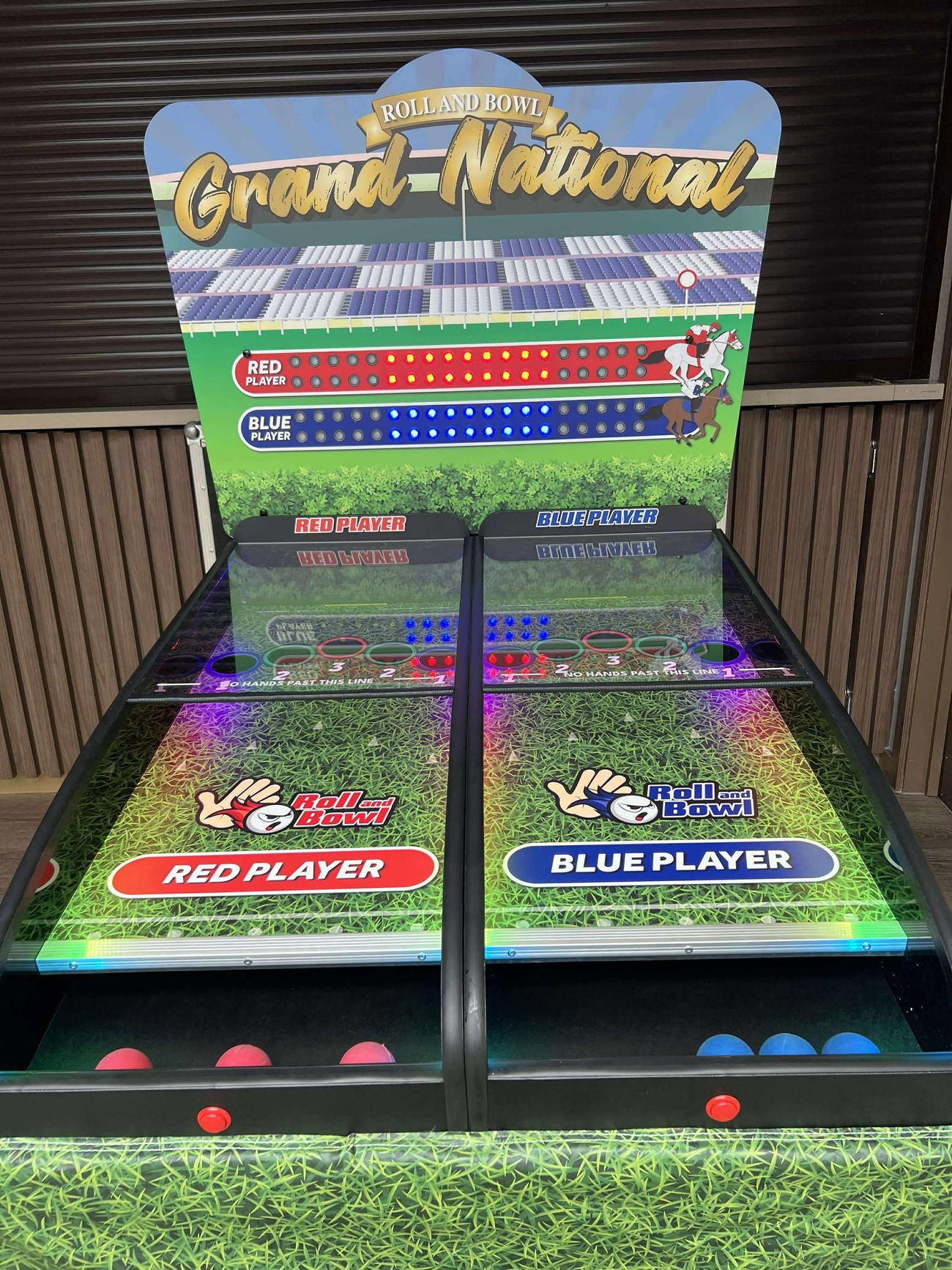 Front view of the Roll and Bowl Grand National game showing both player lanes