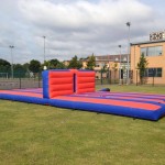 36 inch long inflatable bungee eliminator bed in a field