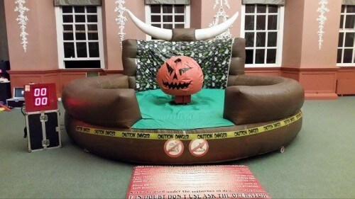 devilish halloween pumpkin rodeo ride with inflatable bed